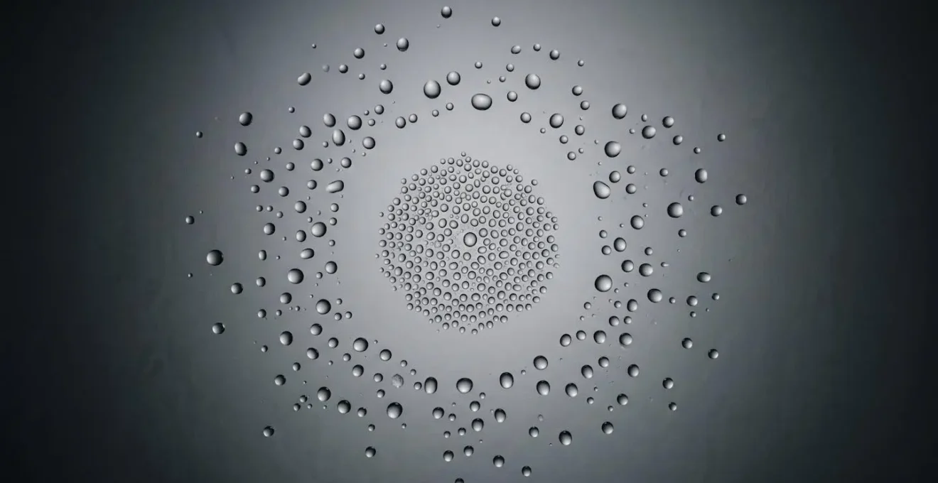 Abstract visualization of touch interaction patterns showing scattered touch points clustered around a target area