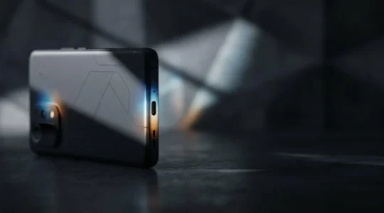 Modern Android smartphone displaying subtle heat patterns and processor activity with soft lighting